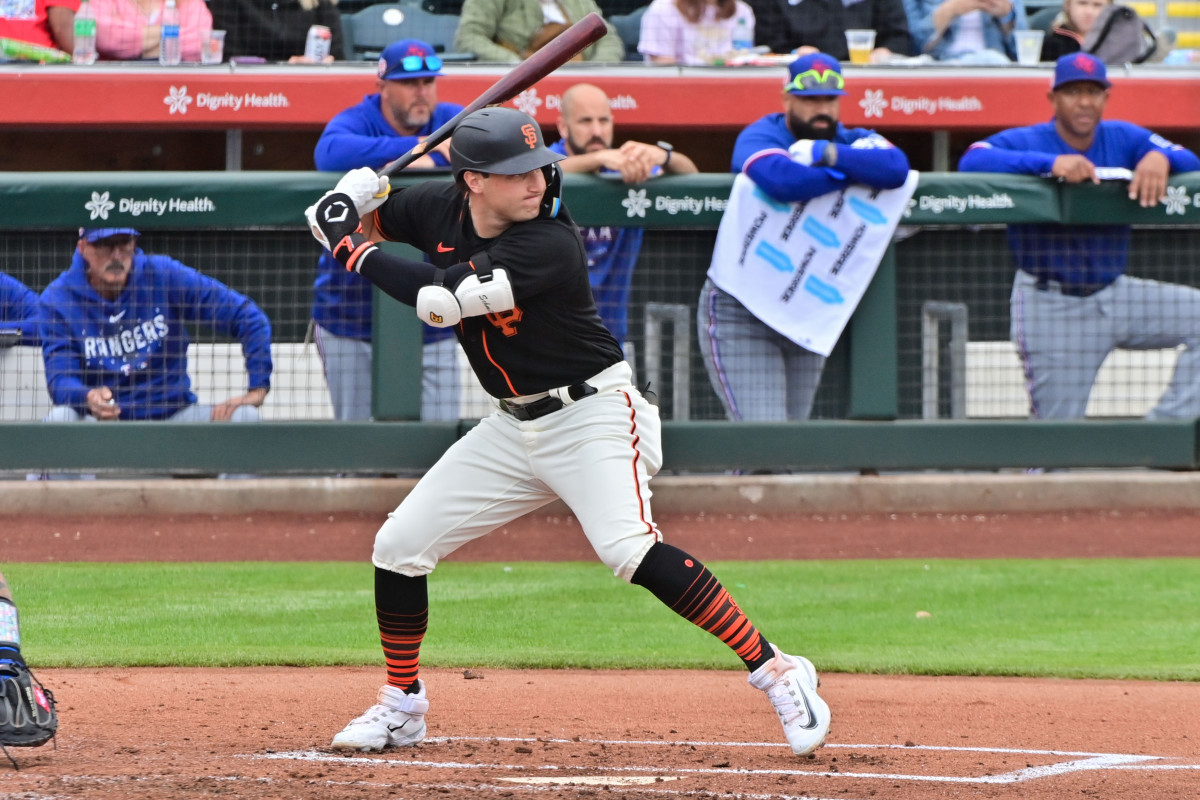 SF Giants DH Casey Schmitt at bat against the Texas Rangers during a Spring Training game. (2023)
